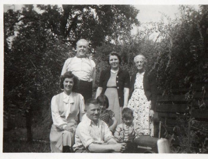 Thomas Garner, Frances, Lizzie, Betty, John Edward, ?, John in car. 81 White Avenue, Langold